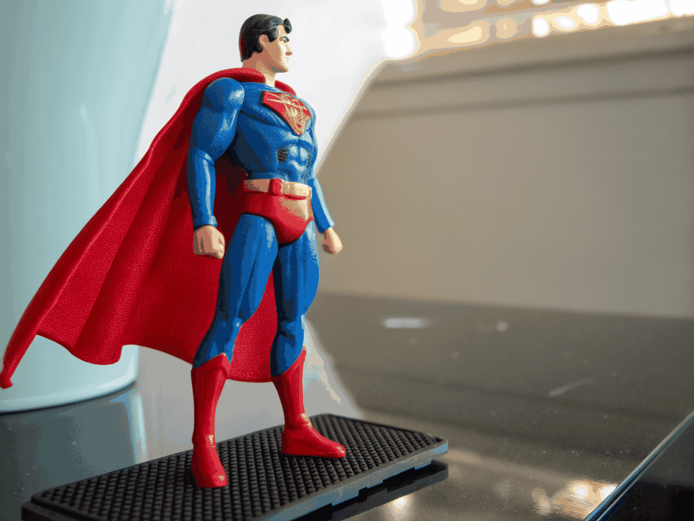 Close-up detail of metallic paint application and sharp tampo pad printed emblem on action figure armor