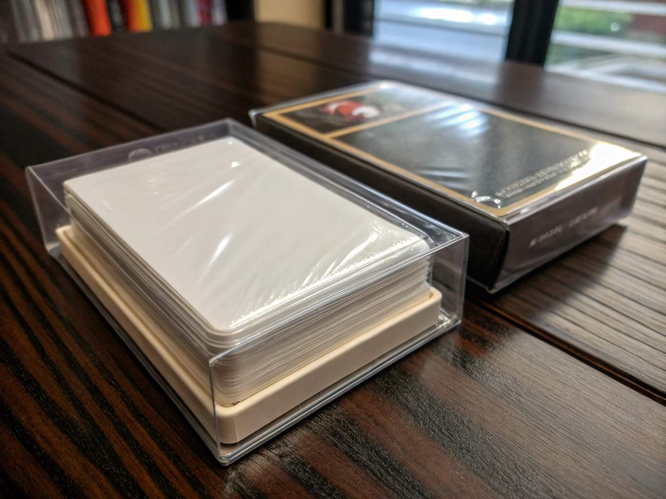 Custom metallic foil blind pouch packaging alongside branded character collector cards