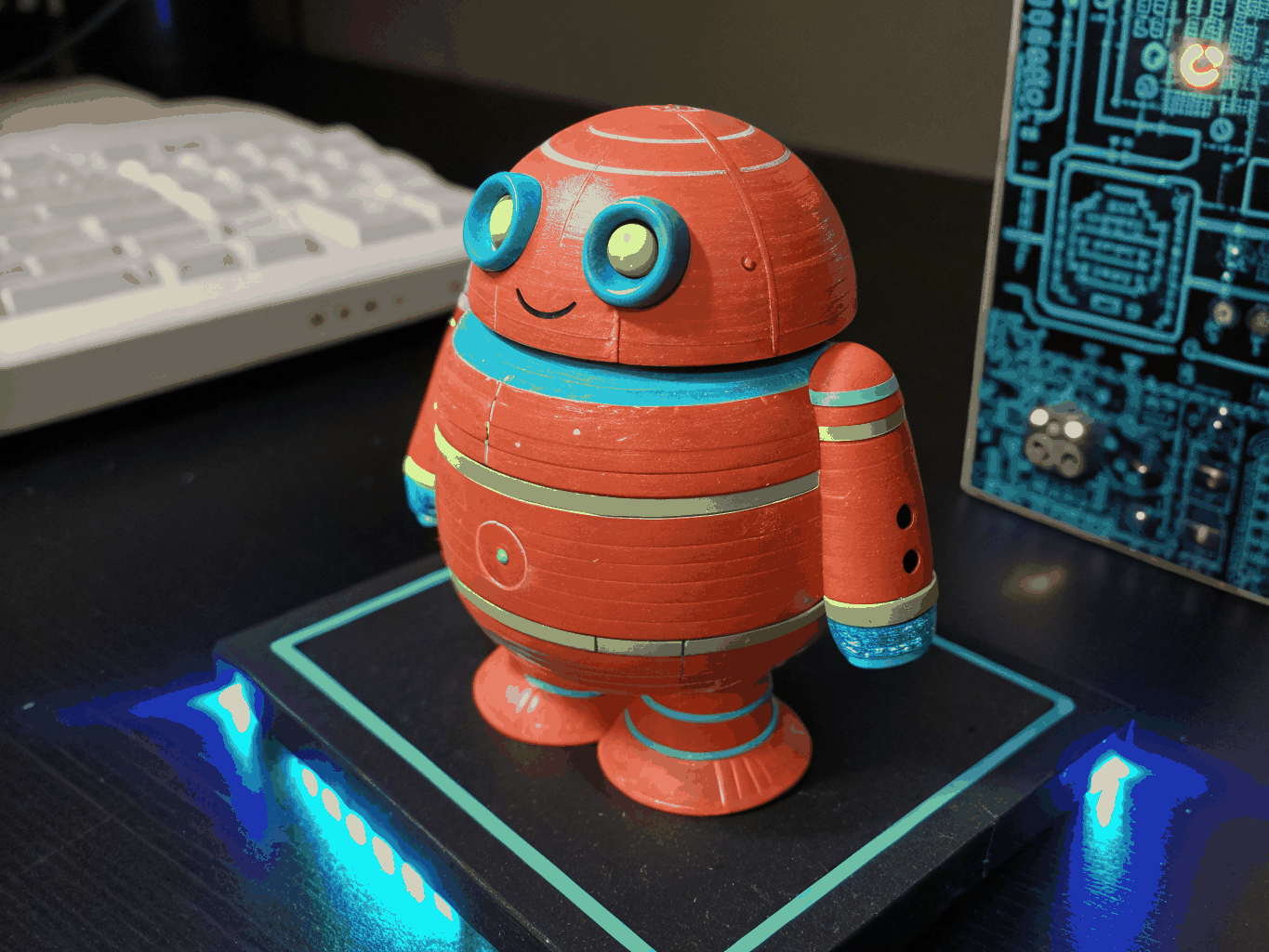 Limited run designer art toy figure with metallic chrome and matte contrast